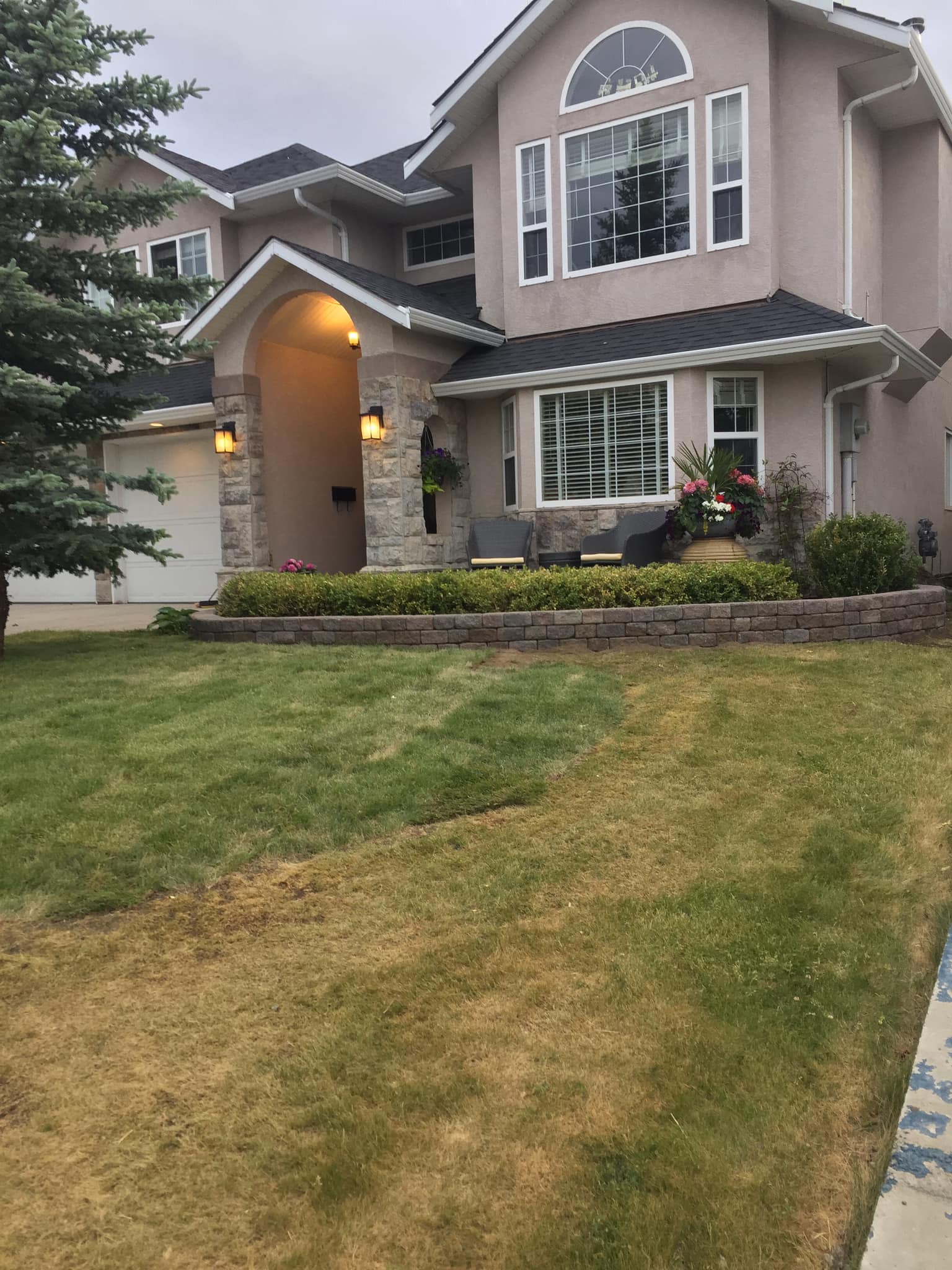 Bare yard before sod installation in Kamloops