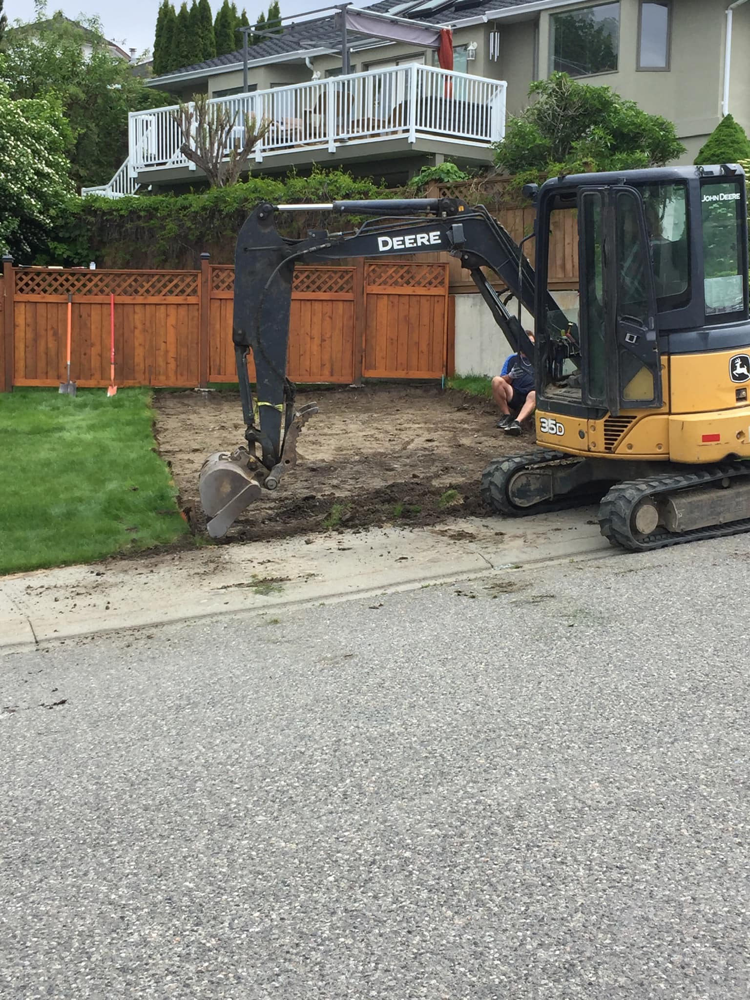 Mini-excavator on a landscaping site in Kamloops